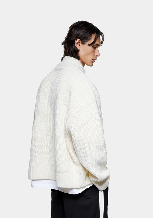 MKI Miyuki Zoku Chunky Rib Knit Track Jacket in Off White at EQVVS. Model Back Angle Shot.