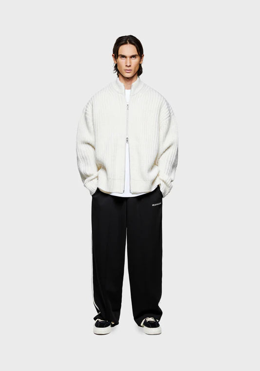MKI Miyuki Zoku Chunky Rib Knit Track Jacket in Off White at EQVVS. Model Front Shot.
