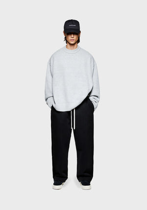 MKI Miyuki Zoku Mohair blend knit jumper in grey. Model shot. 