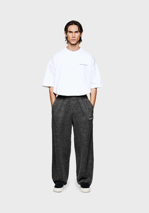 Mohair Blend Knit Wide Leg Joggers in Charcoal by MKI MIYUKI ZOKU at EQVVS. Front Model Shot. 
