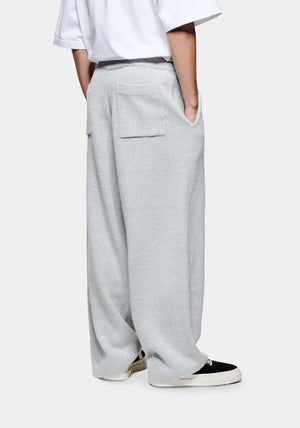 Mohair Blend Knit Wide Leg Joggers in Light Grey by MKI MIYUKI ZOKU at EQVVS . Side Model Shot. 