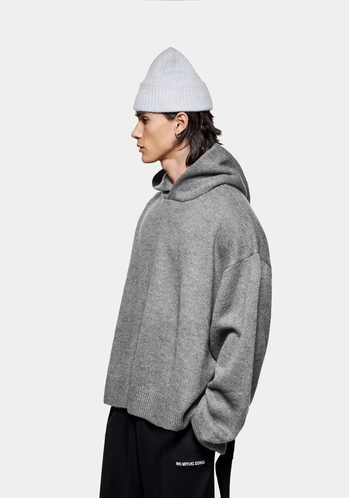 MKI MIYUKI ZOKU Mohair Blend Knit Hoodie in Brown Marl at EQVVS Menswear. Side Model Shot. 