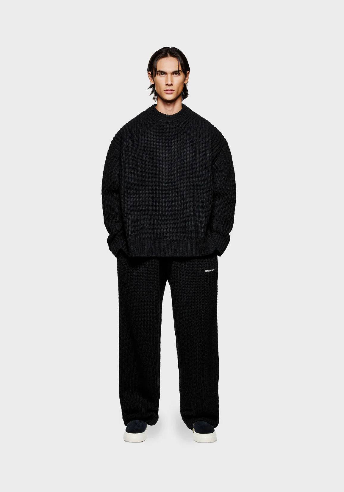 MKI Miyuki Zoku Chunky Rib Knit Crewneck Jumper in Black. Model Front Shot.