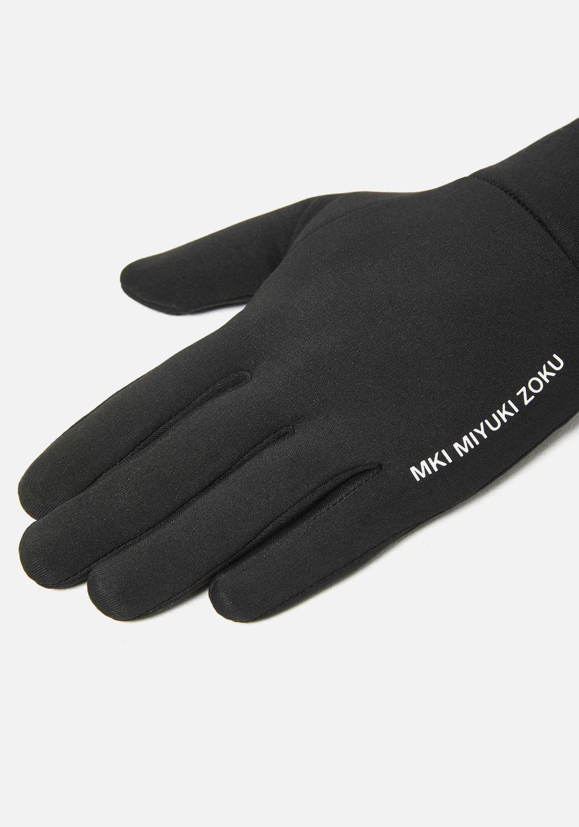 MKI MIYUKI ZOKU Tech Gloves in Black at EQVVS Menswear. Detail Shot. 