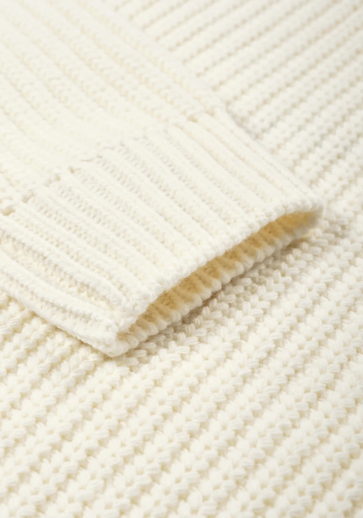 MKI Miyuki Zoku Chunky Rib Knit Hoodie in Off White. at EQVVS Cuff Shot.