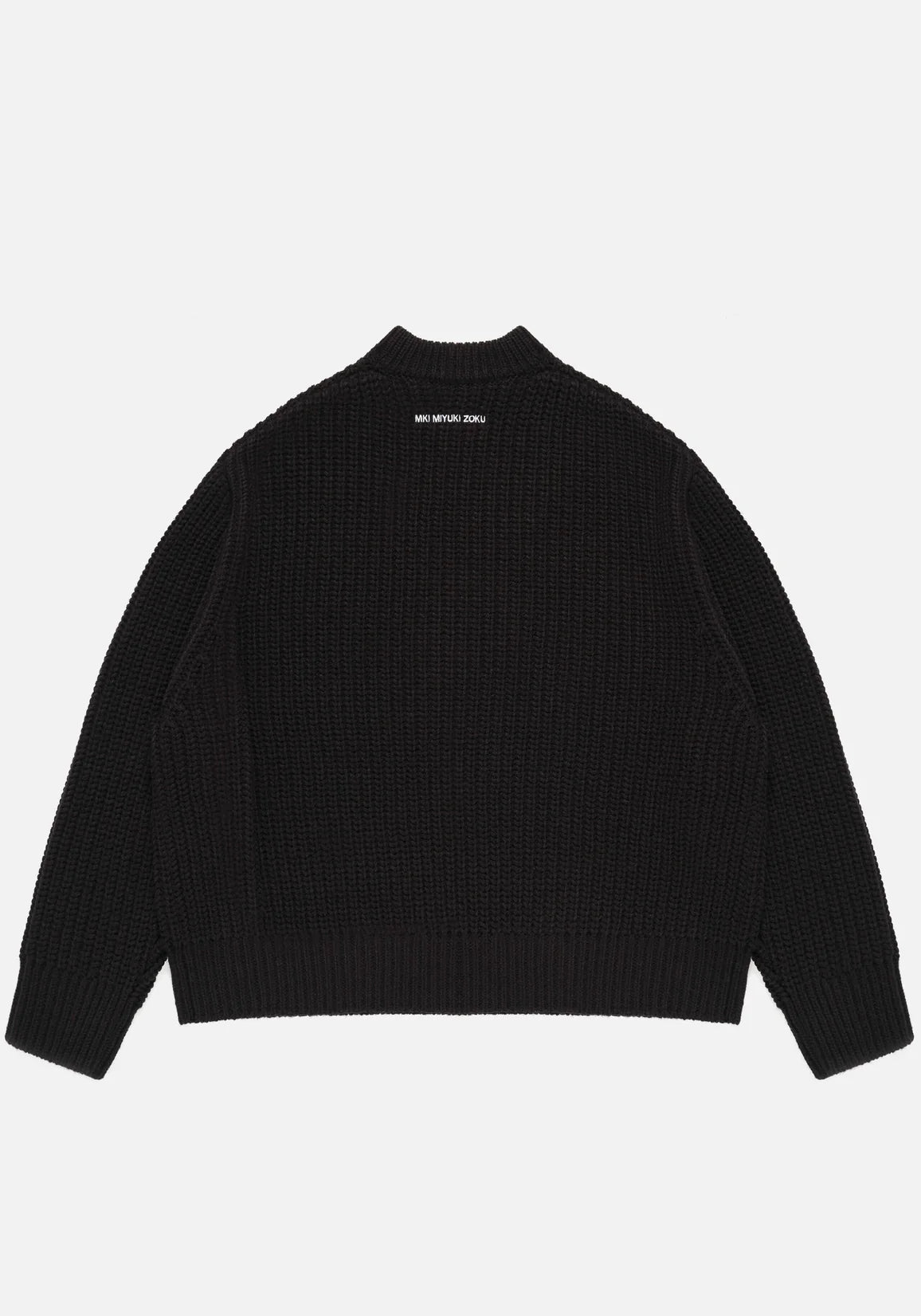 MKI Miyuki Zoku Chunky Rib Knit Crewneck Jumper in Black. Model Angle Shot.