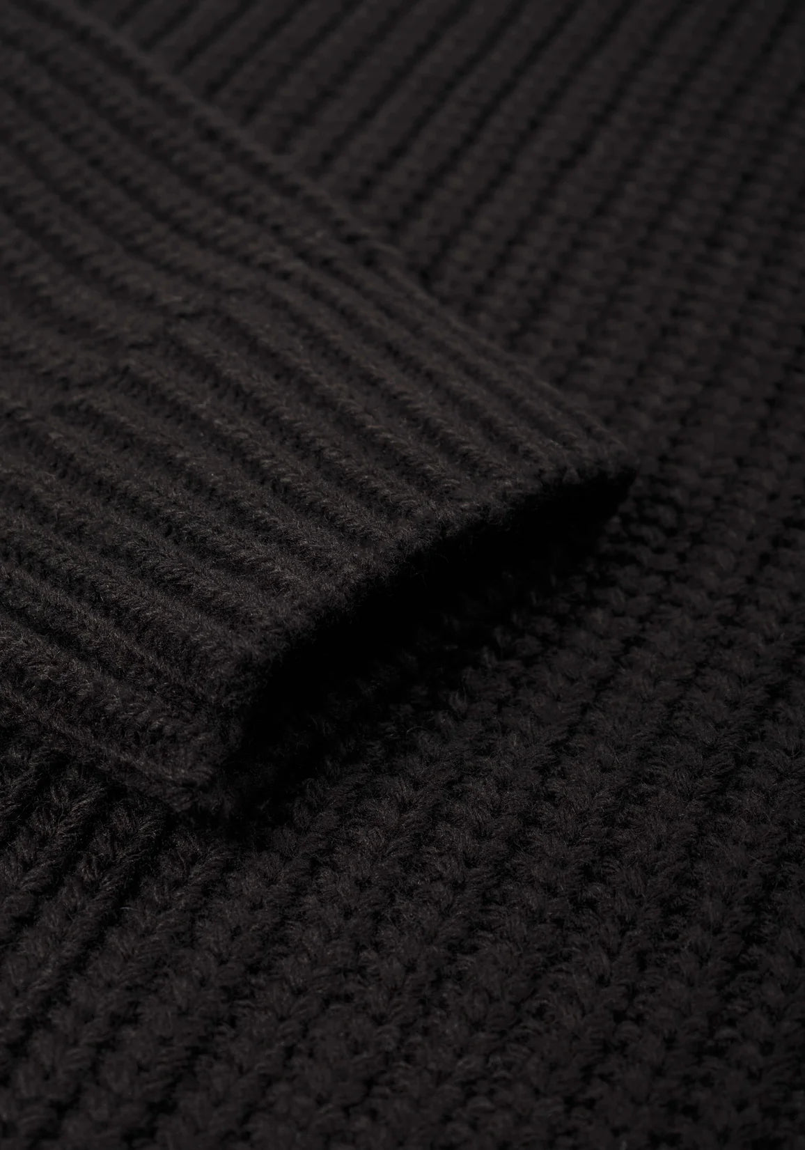 MKI Miyuki Zoku Chunky Rib Knit Crewneck Jumper in Black. Cuff Shot.