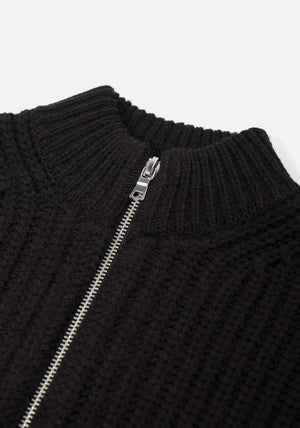 MKI Miyuki Zoku Chunky Rib Knit Track Jacket in Black at EQVVS. Flat Neck Shot.