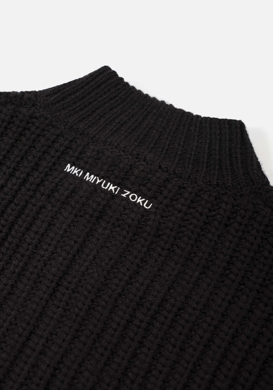 MKI Miyuki Zoku Chunky Rib Knit Track Jacket in Black at EQVVS. Flat Detail Shot.