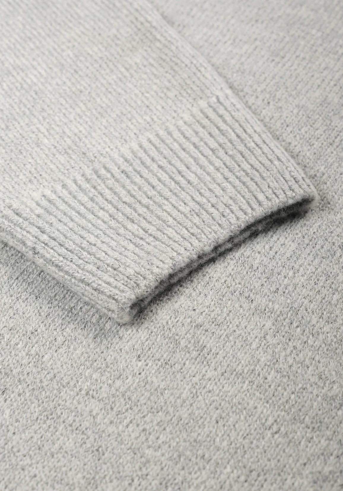 MKI MIYUKI ZOKU Mohair Blend Knit Hoodie in Light Grey at EQVVS Menswear. Detail Shot.