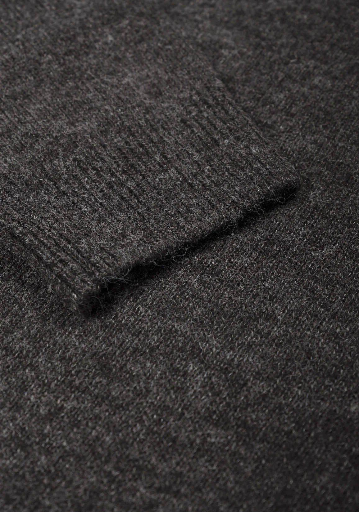 Detail shot Mohair Blend Knit Jumper in Charcoal by MKI Miyuki Zoku. 