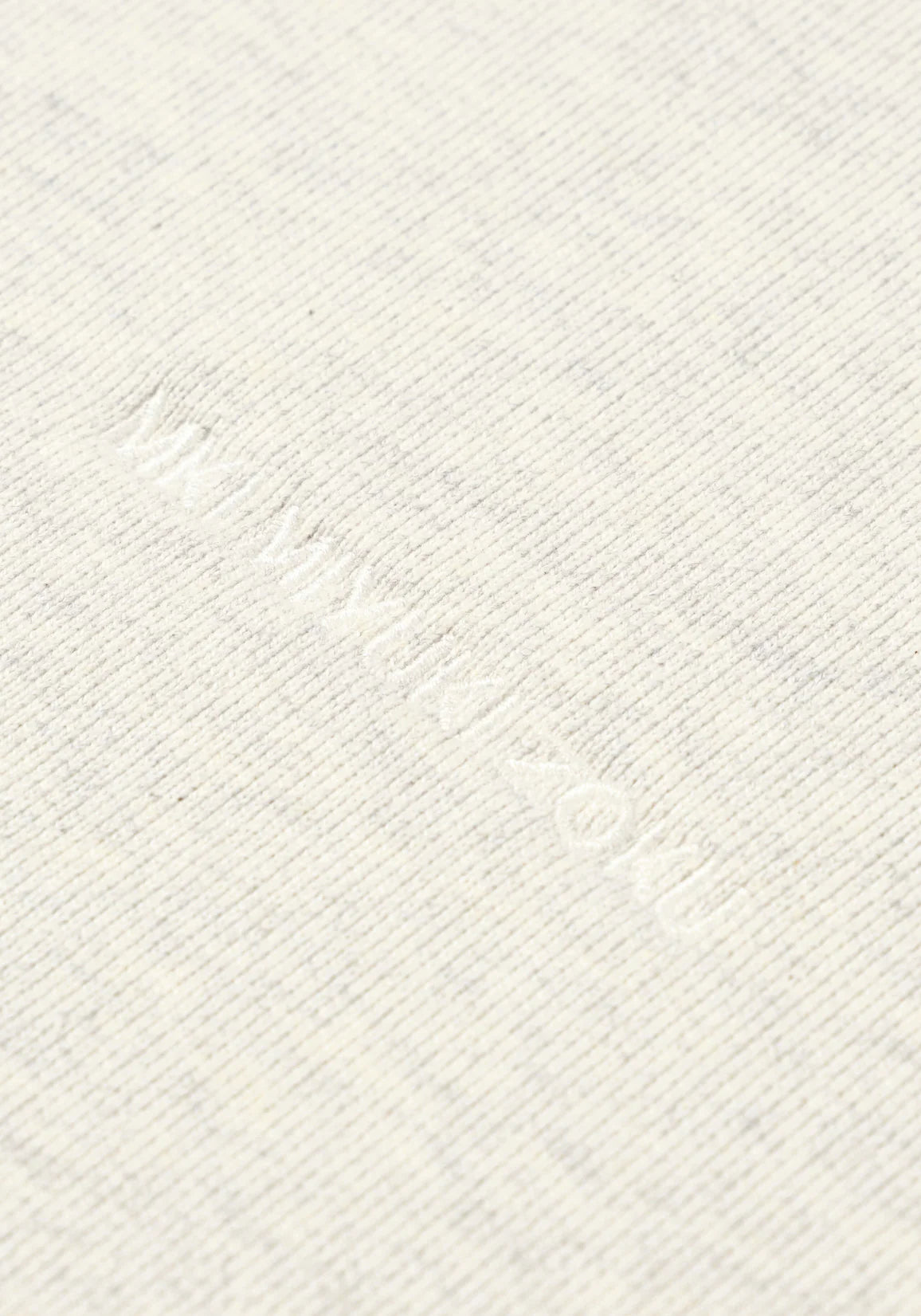 MKI MIYUKI ZOKU Oversized 800 GSM Superweight Sweatshirt in Oatmeal at EQVVS Menswear. Logo Detail Shot. 