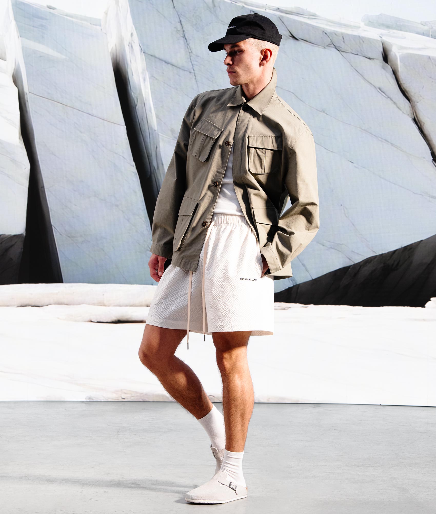 Relaxed Fit Seersucker Shorts in Off White by MKI MIYUKI ZOKU. Campaign Shot.
