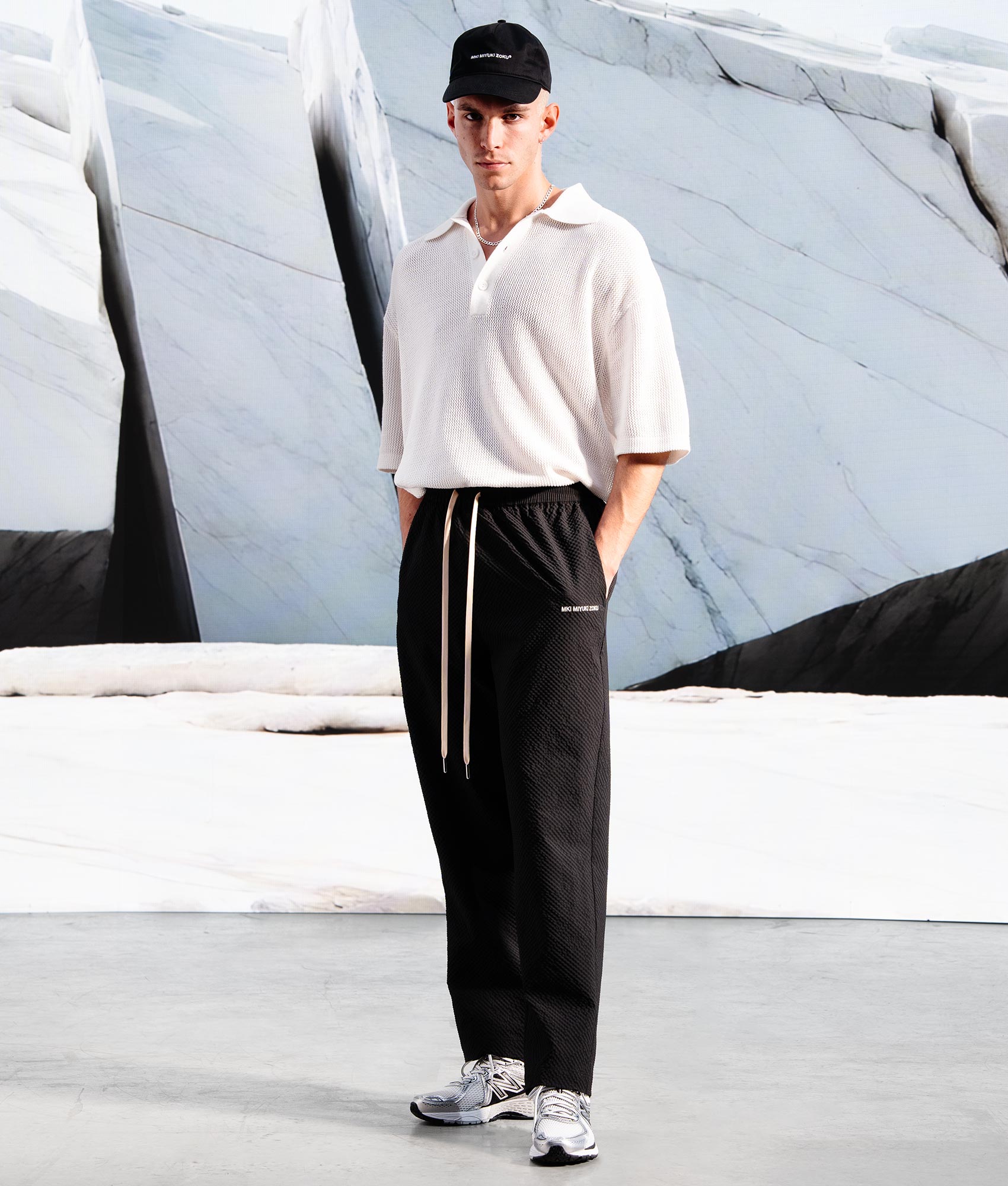 Relaxed Fit Seersucker Trousers in Black by MKI MIYUKI ZUKO, EQVVS Campaign Shot.