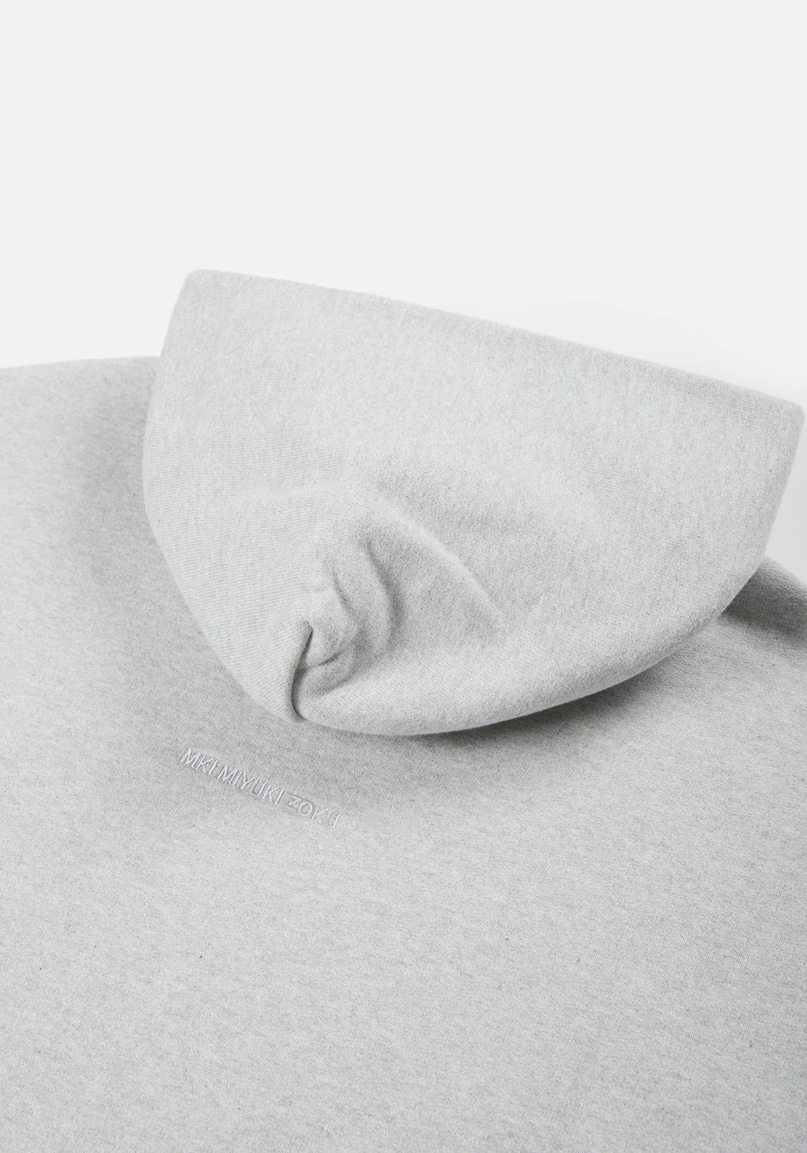 MKI MIYUKI ZOKU 800 GSM Superweight Hoodie in Grey at EQVVS. Detail Shot. 