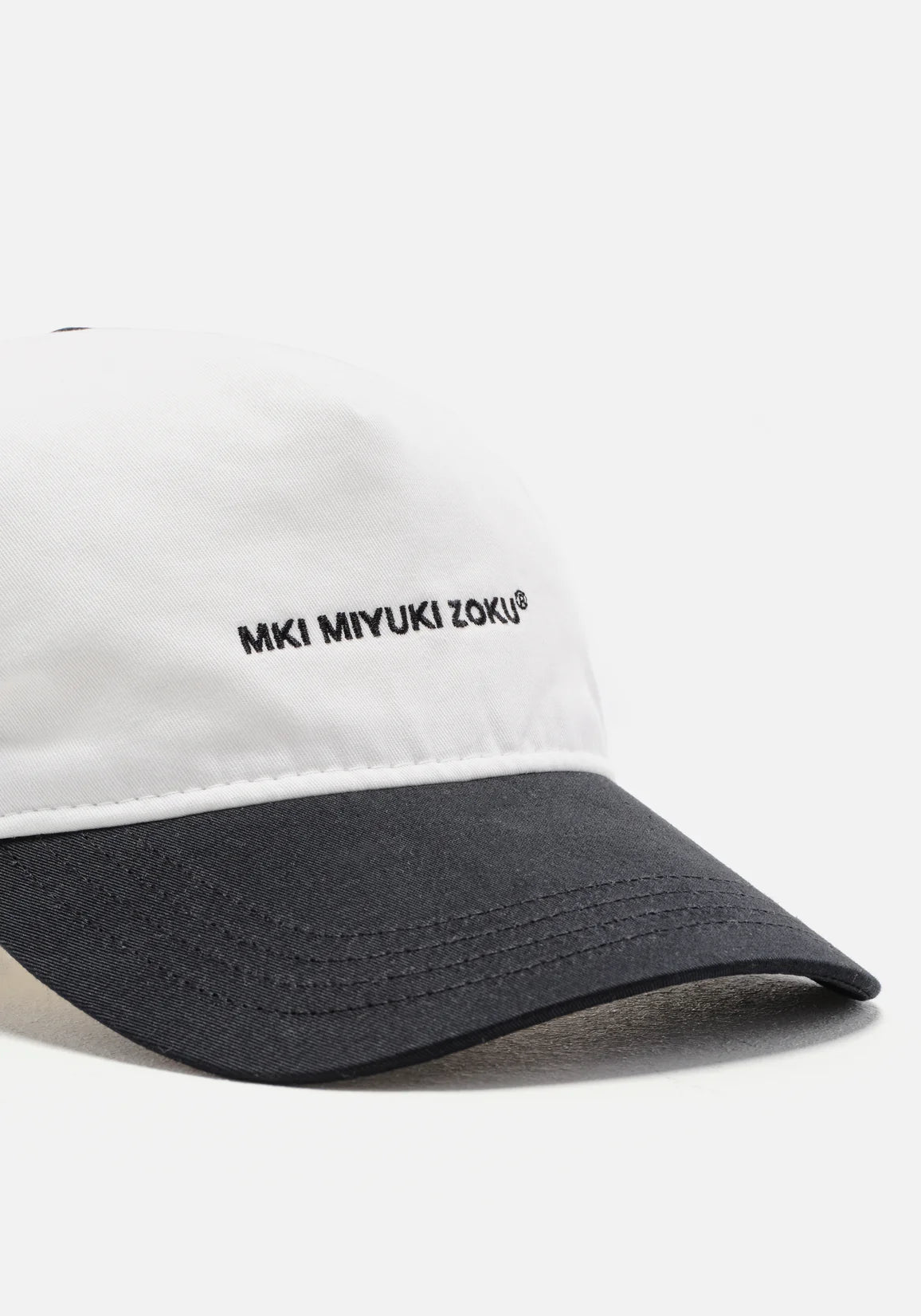 V2 Twill Ball Cap in Contrast White and Black by MKI MIYUKI ZOKU at EQVVS. Detail Shot. 
