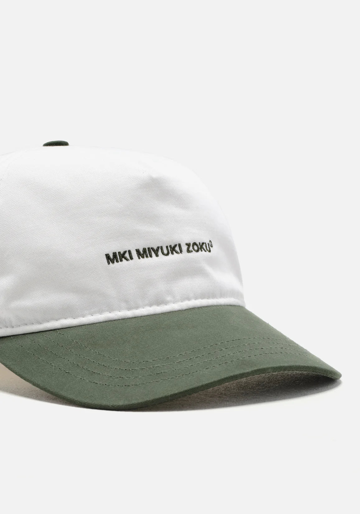 V2 Twill Ball Cap in Contrast Green by MKI MIYUKI ZOKU at EQVVS. Detail Shot. 