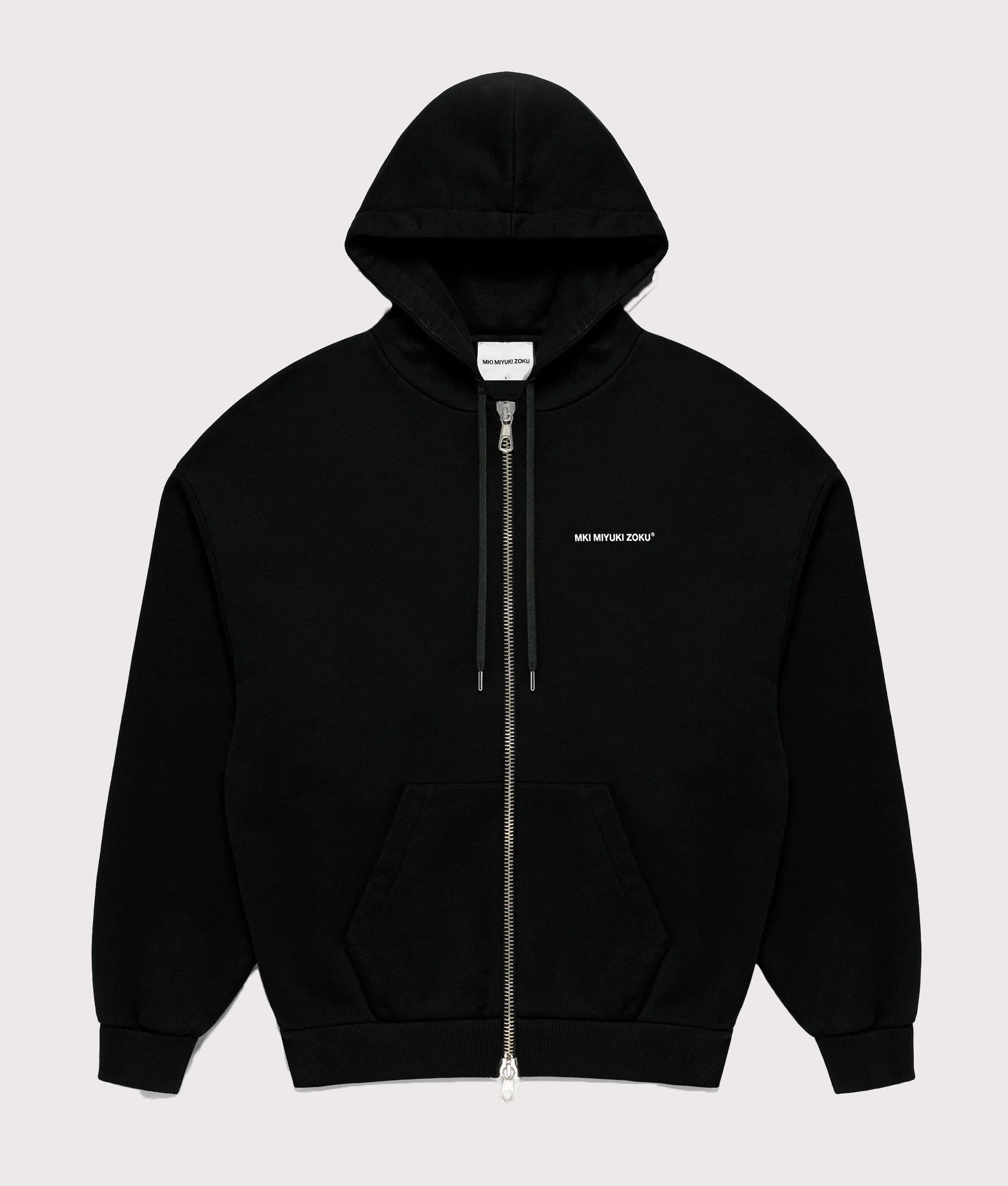 MKI MIYUKI ZOKU Oversized Uniform zip through hoodie in Black at EQVVS Menswear. Flat shot.