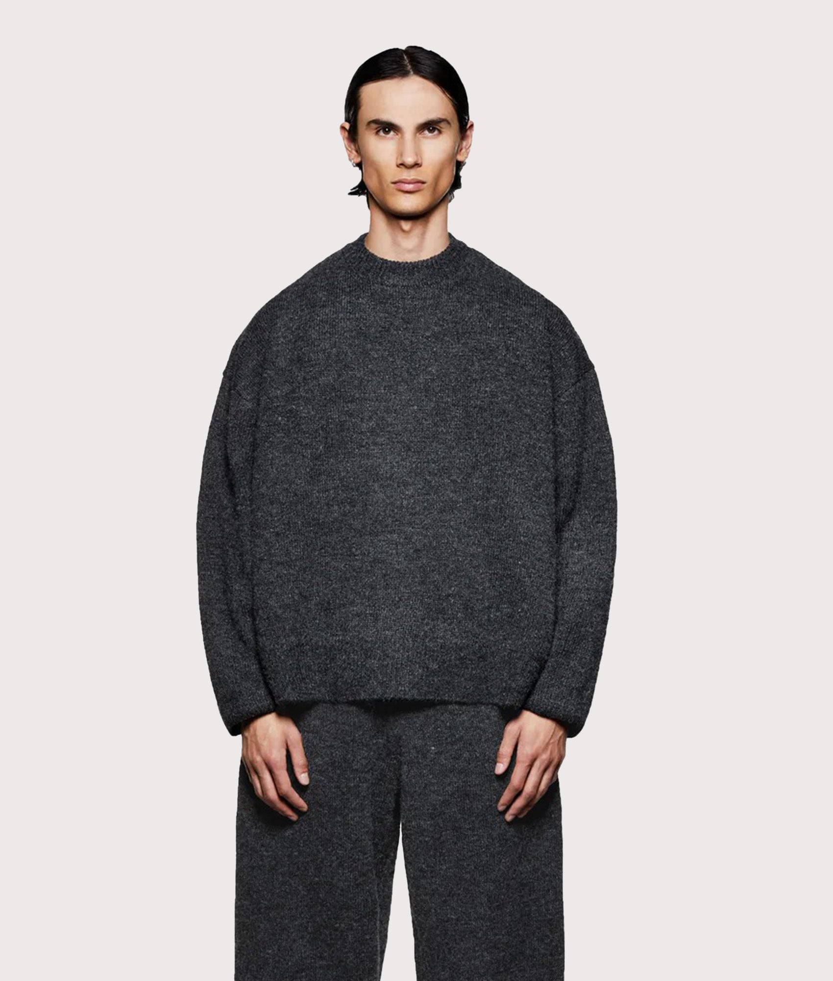 MKI MIYUKI ZOKU Mohair Blend Crewneck Jumper in Charcoal at EQVVS Menswear. Model front shot.