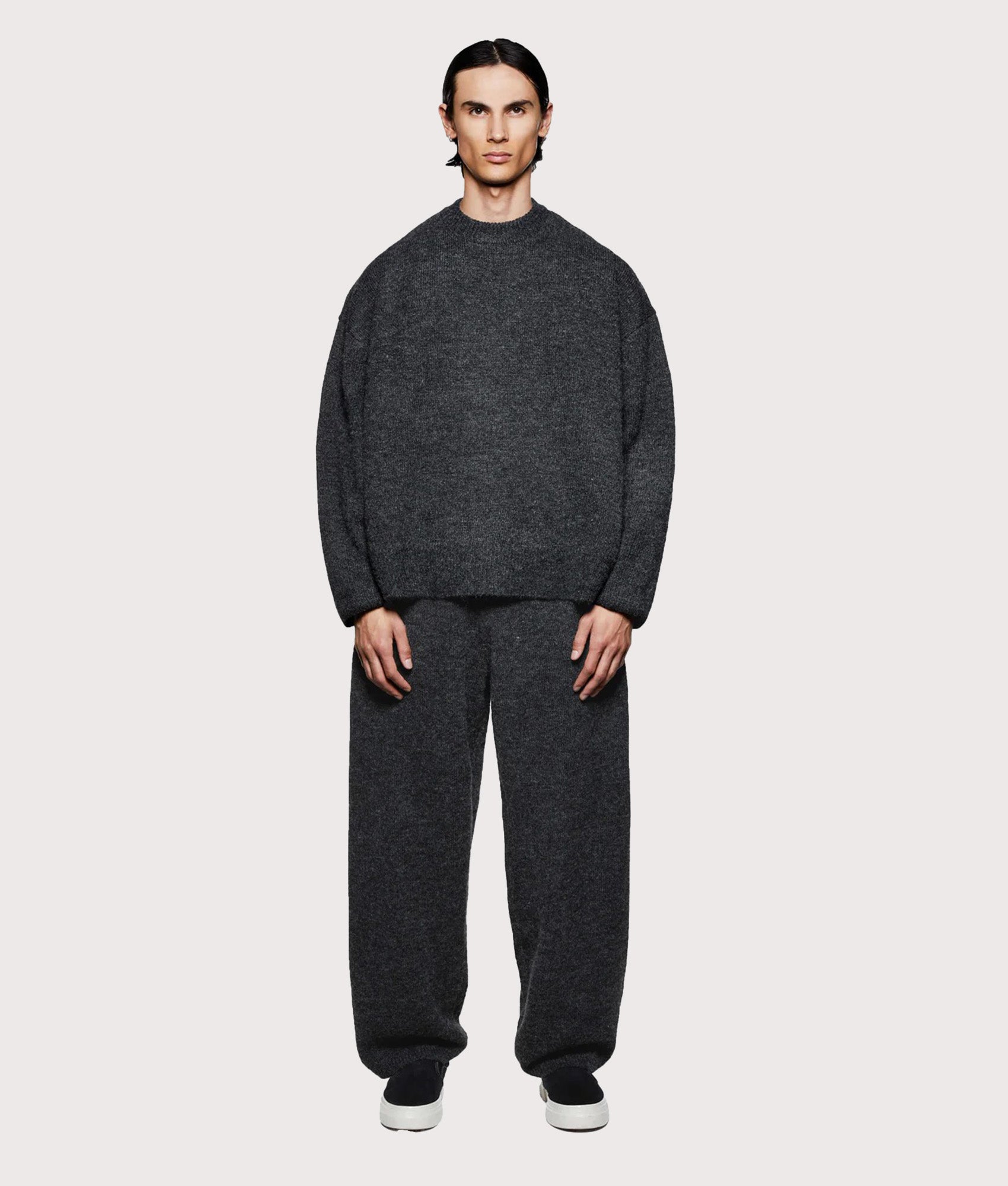 MKI MIYUKI ZOKU Mohair Blend Crewneck Jumper in Charcoal at EQVVS Menswear. Model full front shot.