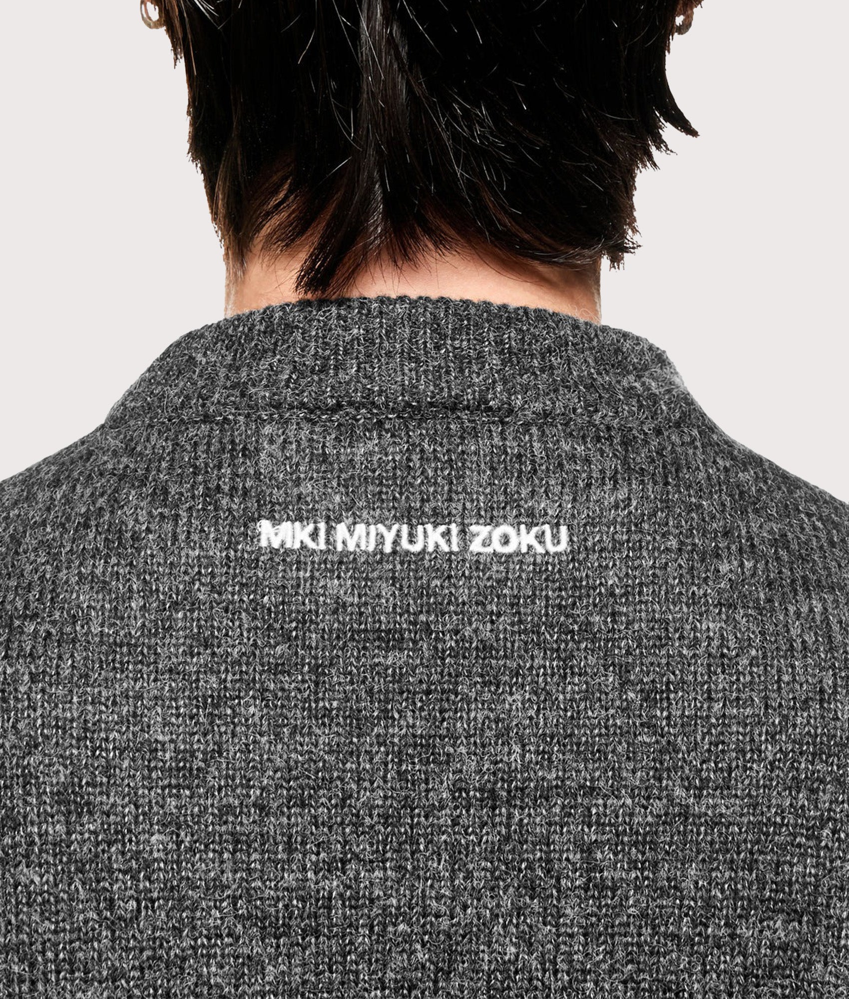 MKI MIYUKI ZOKU Mohair Blend Crewneck Jumper in Charcoal at EQVVS Menswear. Detail shot.