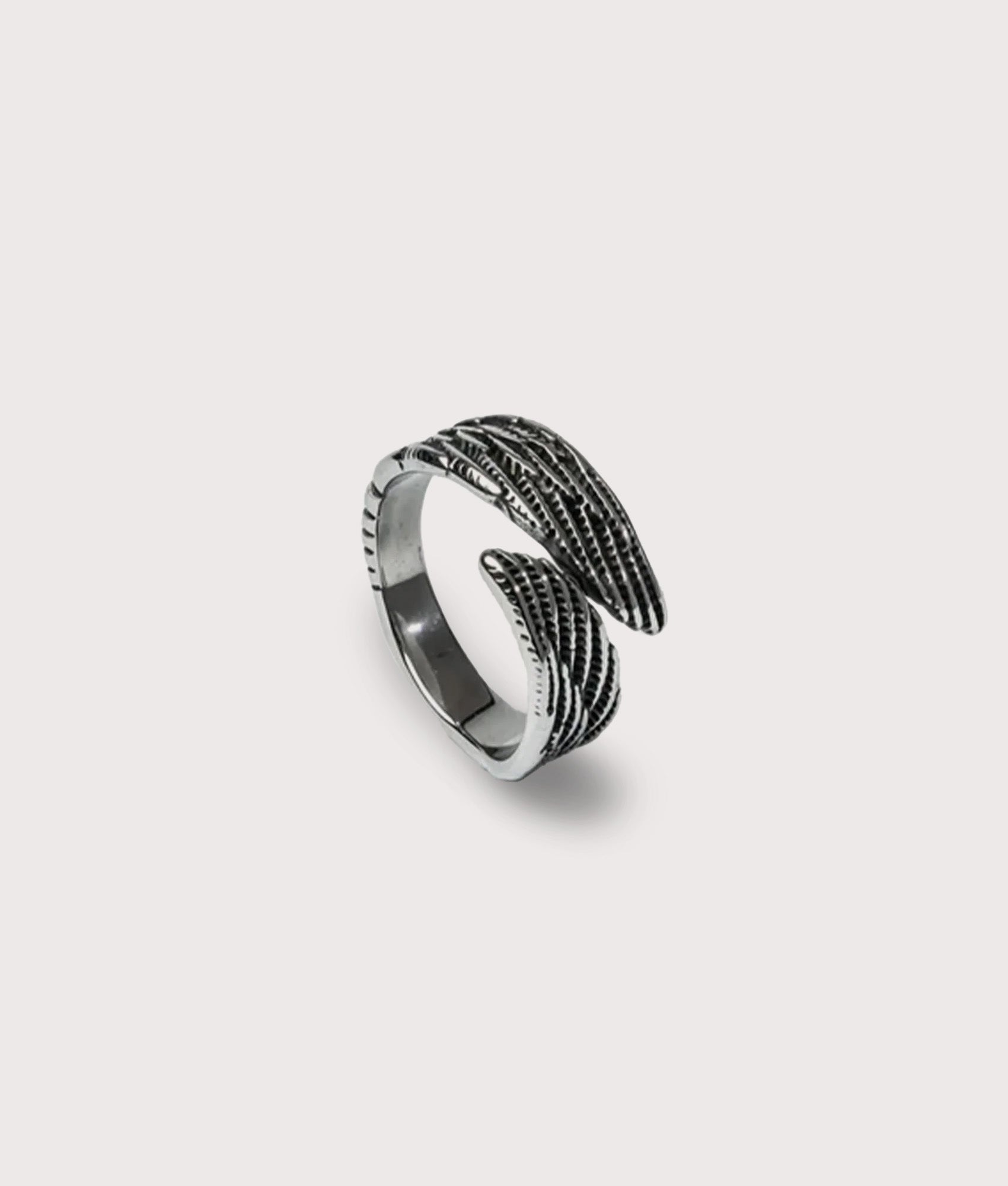 Mysterious Jeweller Silver Stainless Steel Wing Ring at EQVVS Menswear. Side shot.