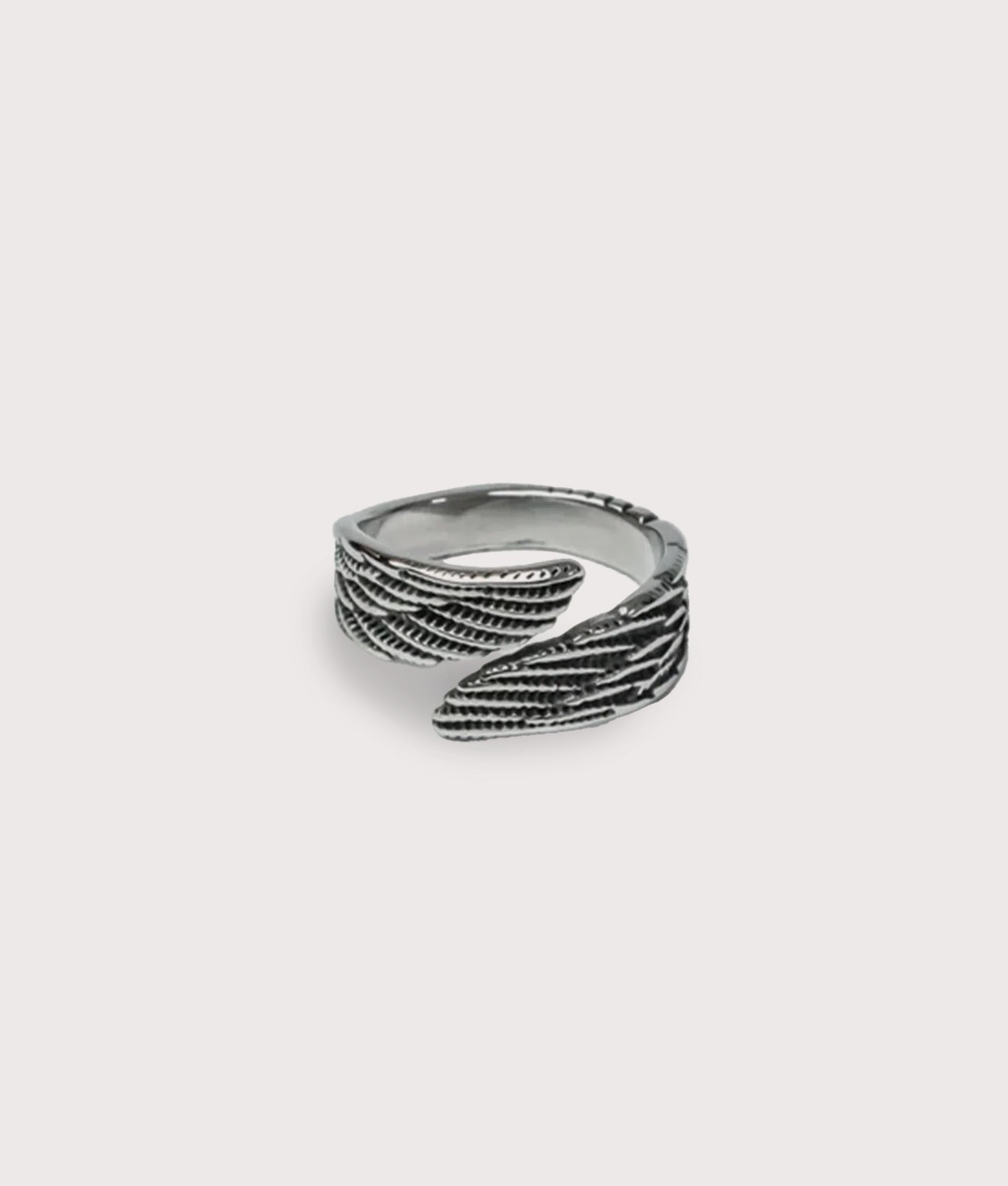 Mysterious Jeweller Silver Stainless Steel Wing Ring at EQVVS Menswear. Flat shot.