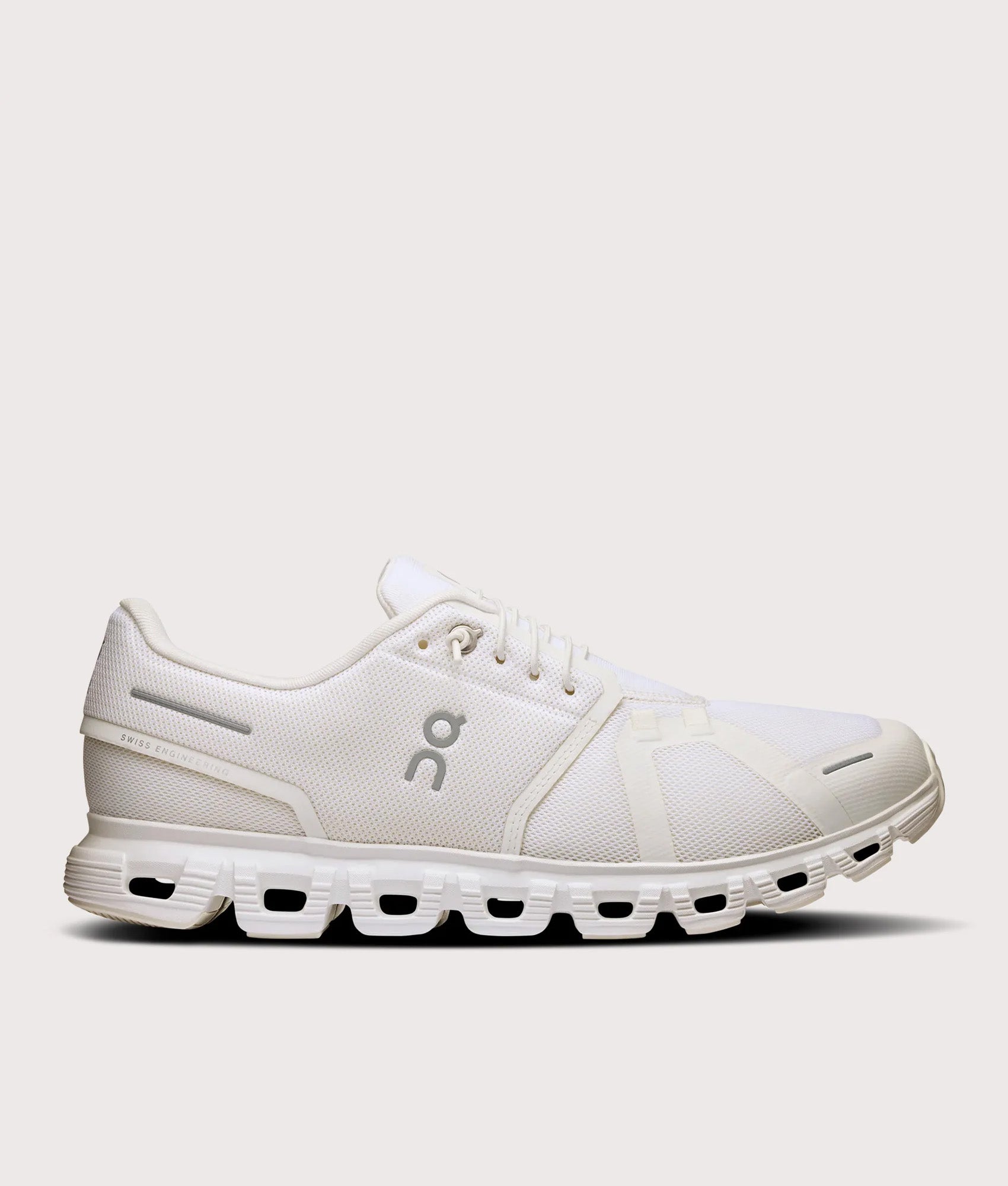 On Cloud 6 Sneakers in White on White at EQVVS Menswear. Side shot.