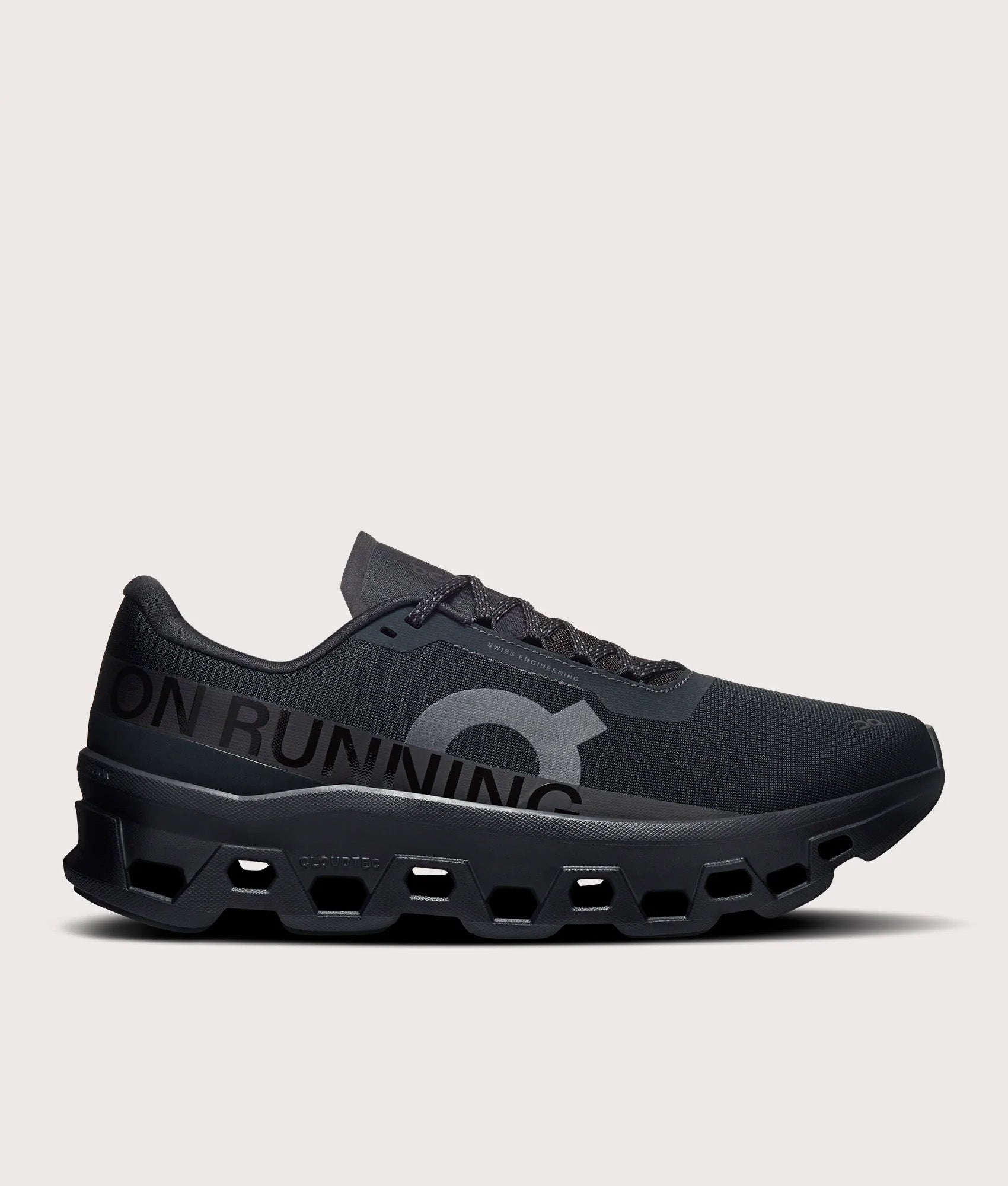 On Cloudmonster 1 Sneakers in Black/Black at EQVVS Menswear. Side shot.