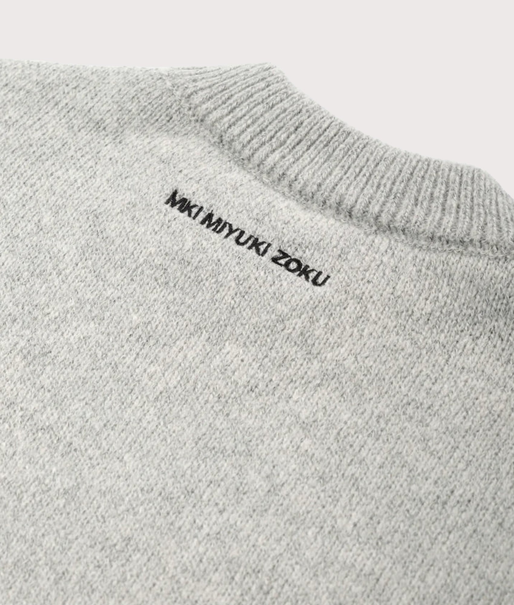 MKI Miyuki Zoku Oversized Mohair Blend Knit Crew Jumper in Light Grey at EQVVS Menswear.  Detail shot.