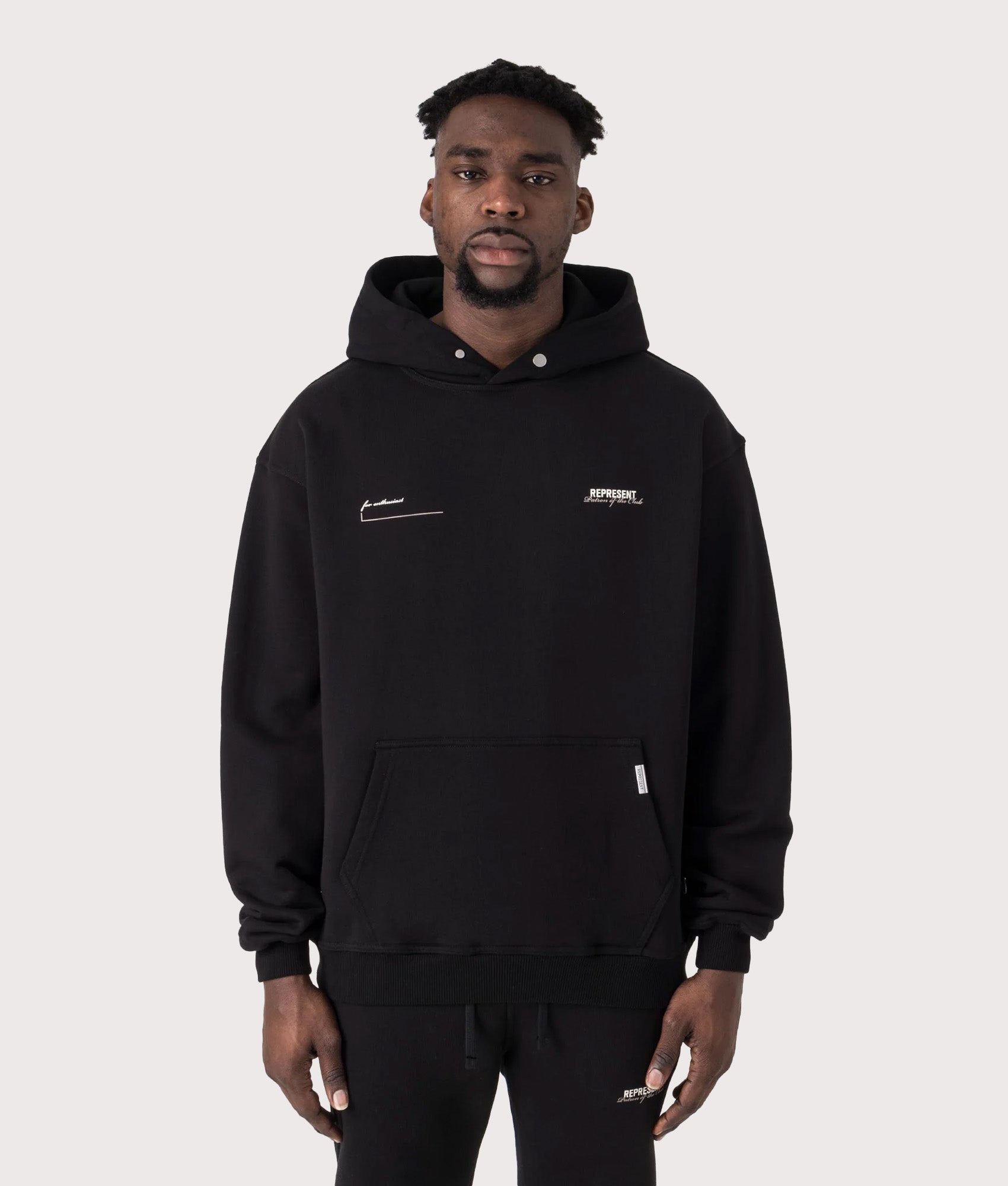 REPRESENT Oversized Patron Of The Club Hoodie in Black at EQVVS Menswear. Front shot.