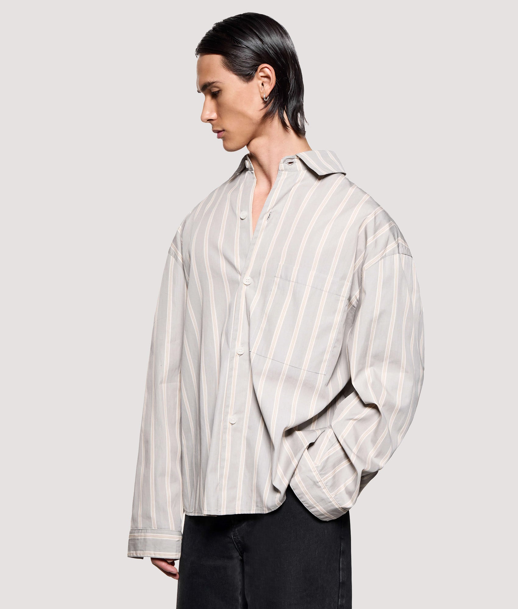MKI MIYUKI ZOKU Box Fit Poplin Stripe Dress Shirt in Light Grey at EQVVS Menswear. Angled model front shot.
