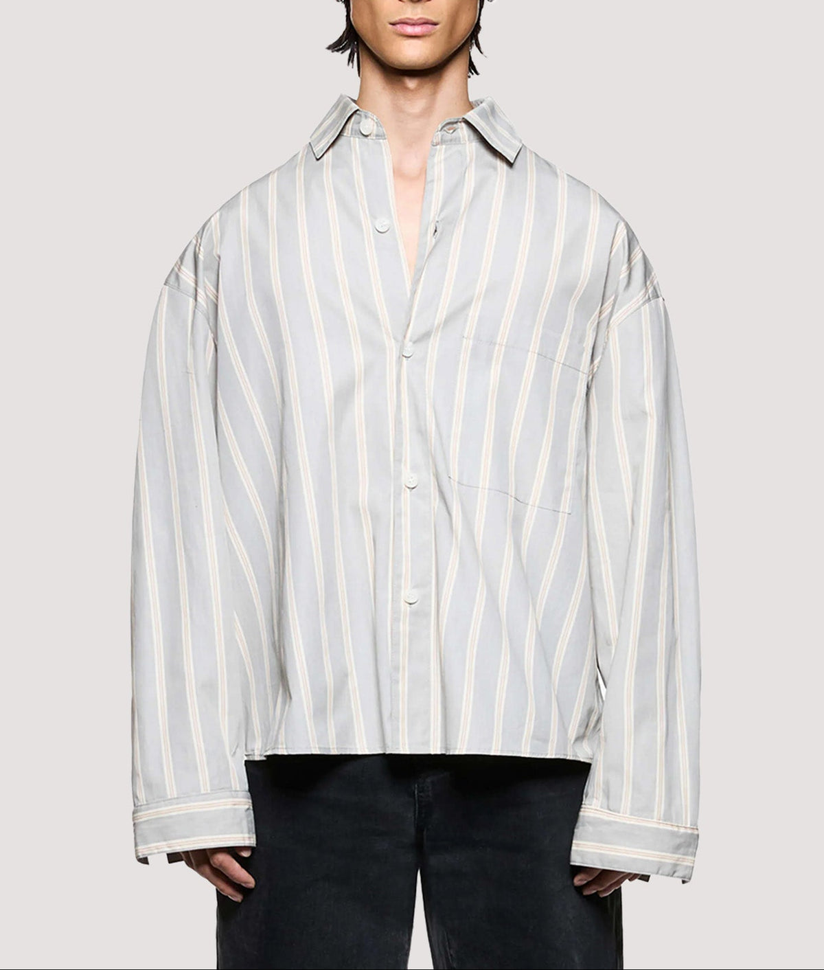 MKI MIYUKI ZOKU Box Fit Poplin Stripe Dress Shirt in Light Grey at EQVVS Menswear. Model front shot.