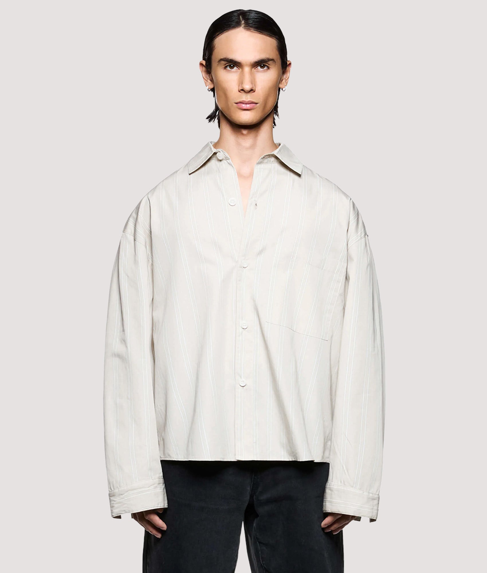 MKI MIYUKI ZOKU Box Fit Poplin Stripe Dress Shirt in Light Sage at EQVVS Menswear. Model front shot.