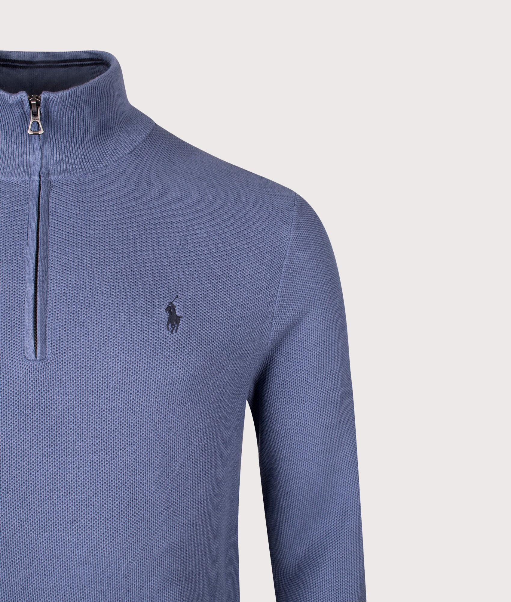 Polo Ralph Lauren Quarter Zip Contrast Logo Knit Jumper in Capri blue at EQVVS Menswear. Detail shot.