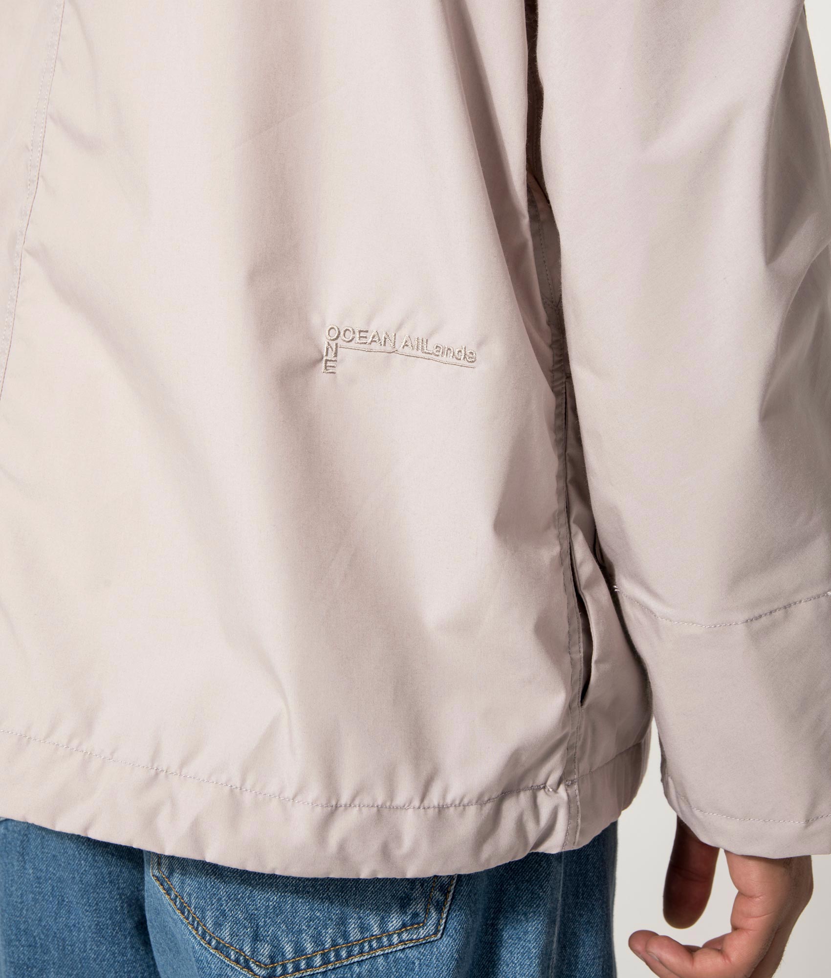 nanamica, Hooded Deck Jacket, Gray Beige, Eqvvs Menswear, Model detail shot angle