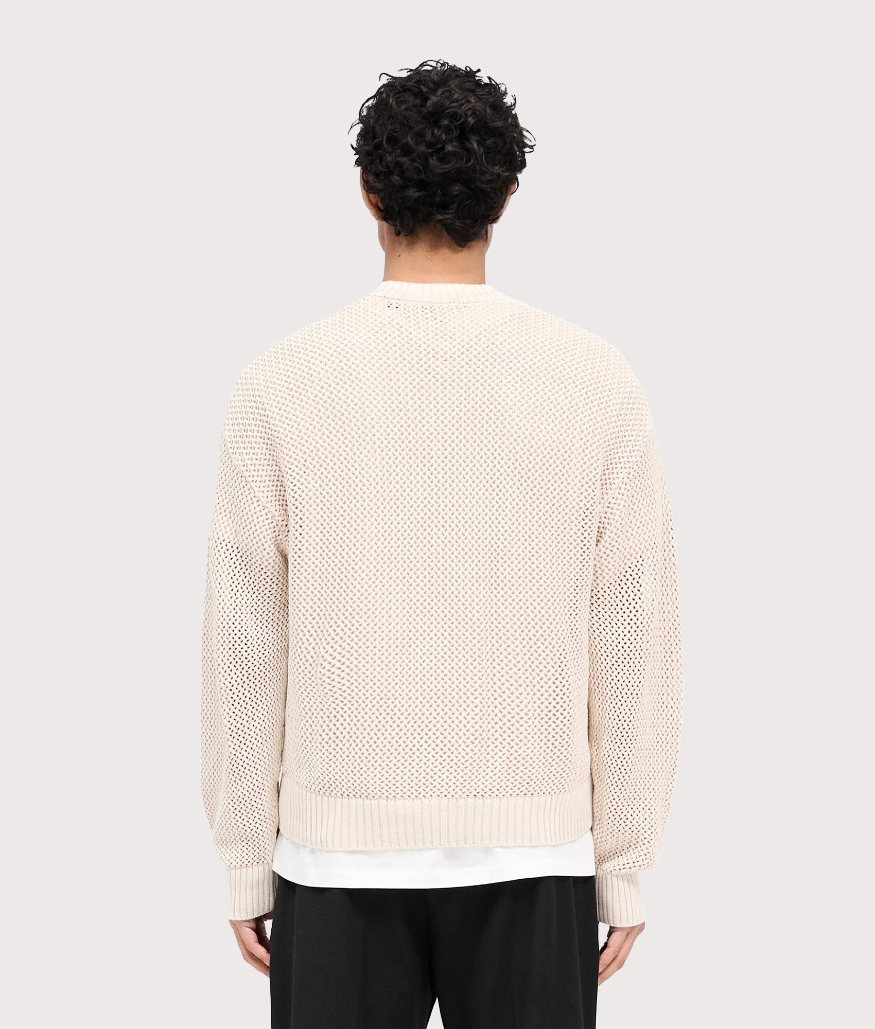 REPRESENT Oversized Fit Open Gauge Knit Jumper in Off White at EQVVS Menswear. Model Back shot.