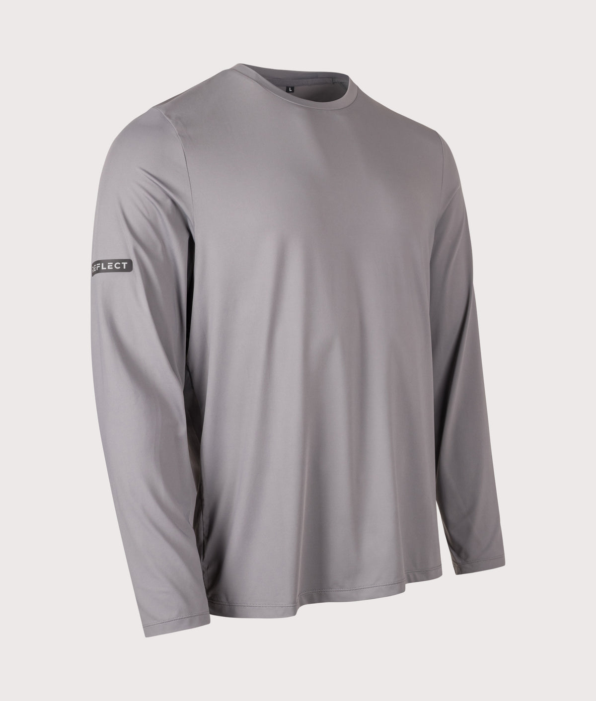 REFLECT Long Sleeve Training T-Shirt in Grey at EQVVS Menswear. Angled front shot.