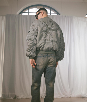 REPRESENT Icarus Flight Bomber Jacket in Khaki with Embroidery to the back and chest back Campaign shot at EQVVS