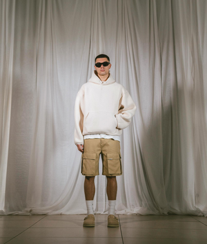 Represent Fleece Oversized Hoodie in papyrus beige Model front Campaign shot at EQVVS