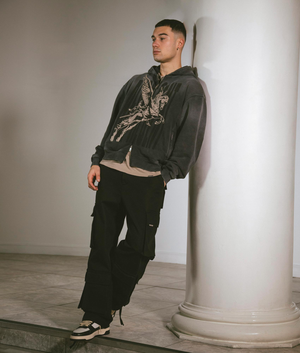 REPRESENT Spirits Mascot Zip Through Hoodie in Aged Black with Front Print Front Campaign Shot EQVVS
