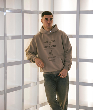 Represent Horizons Hoodie in Washed Taupe with Front Print Model Front Campaign Shot at EQVVS