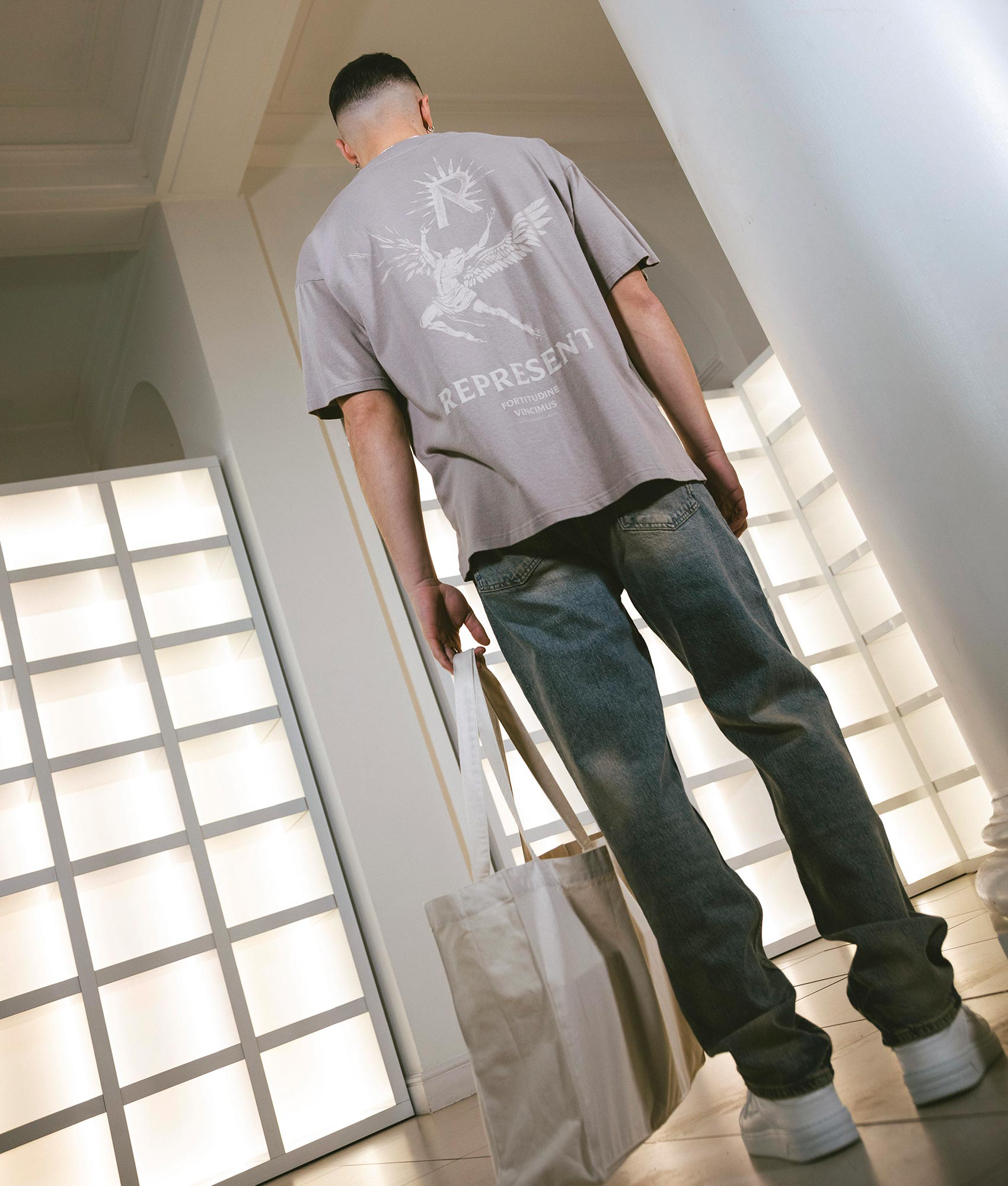 REPRESENT Icarus T-Shirt in Taupe with Icarus Print Model Back Campaign Shot at EQVVS