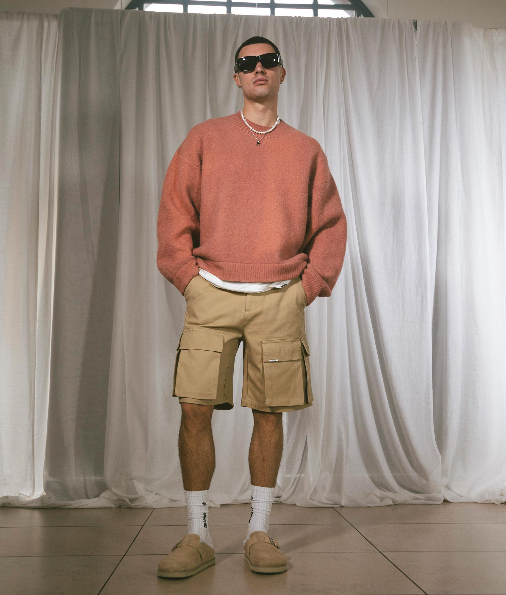 REPRESENT Sprayed Horizons Sweatshirt in Sunrise Pink Model Front Campaign Shot at EQVVS