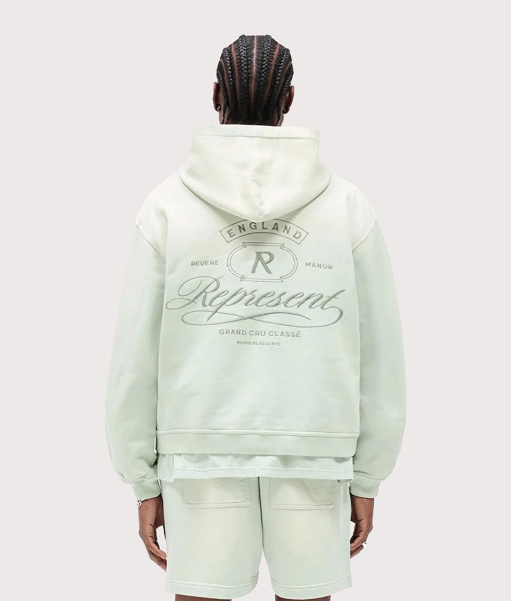 Represent Grand Vintage Hoodie in Sage Green at EQVVS Menswear. Back shot.