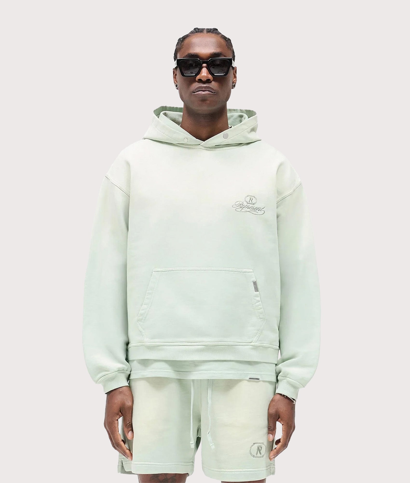 Represent Grand Vintage Hoodie in Sage Green at EQVVS Menswear. Front shot.