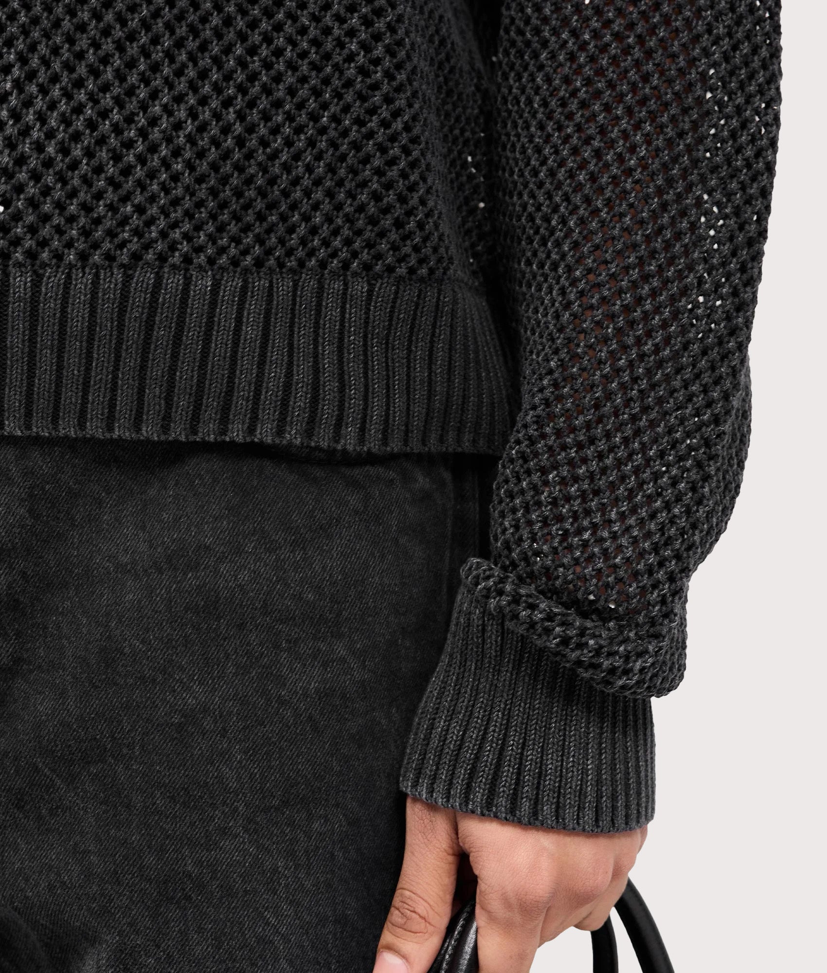 REPRESENT Open Gauge Knit Jumper in Jet Black. Detail shot.