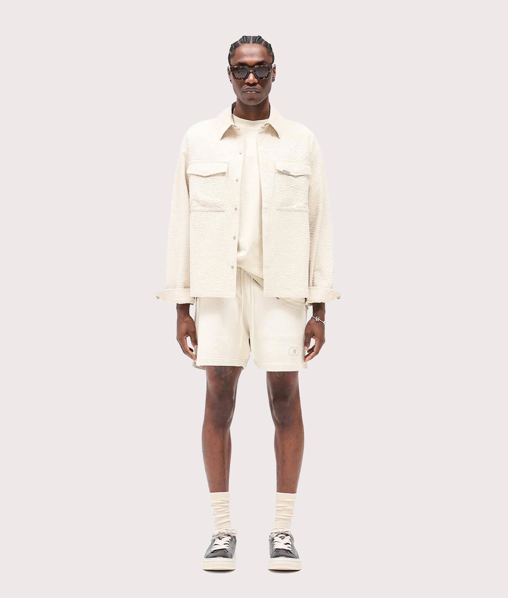 Represent Textured Long Sleeve Shirt in Champagne at EQVVS Menswear. Model full front shot.