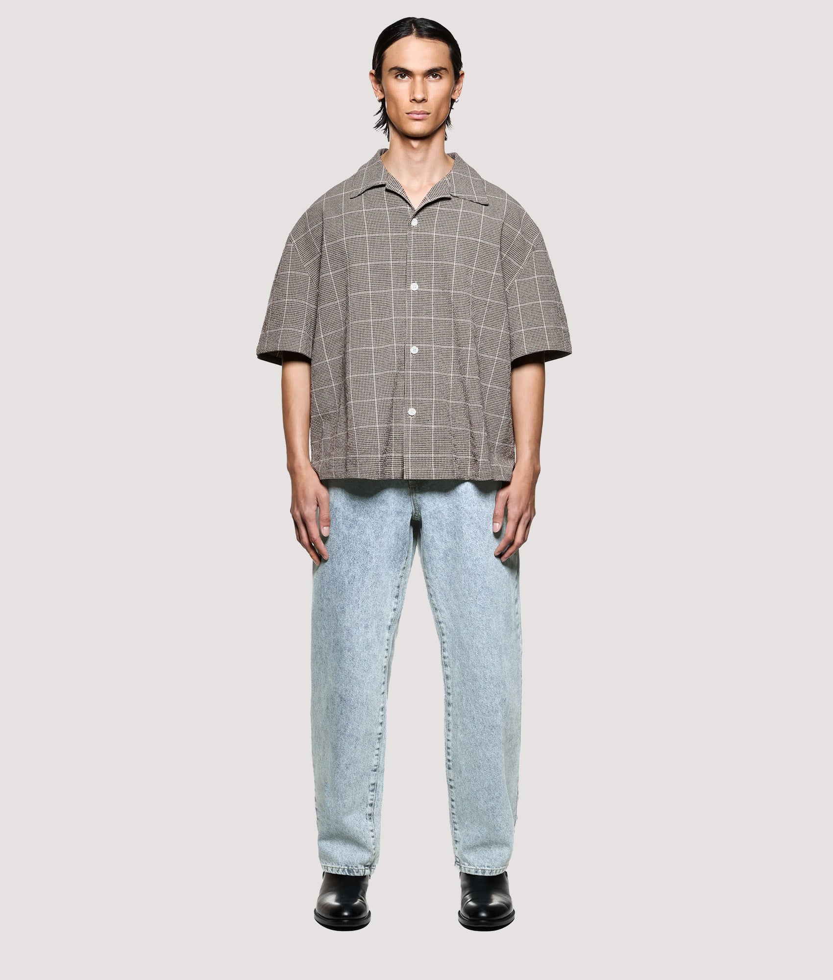 MKI MIYUKI ZOKU Box Fit Linen Short Sleeve Vacation Shirt in Brown at EQVVS Menswear. Model full front shot.