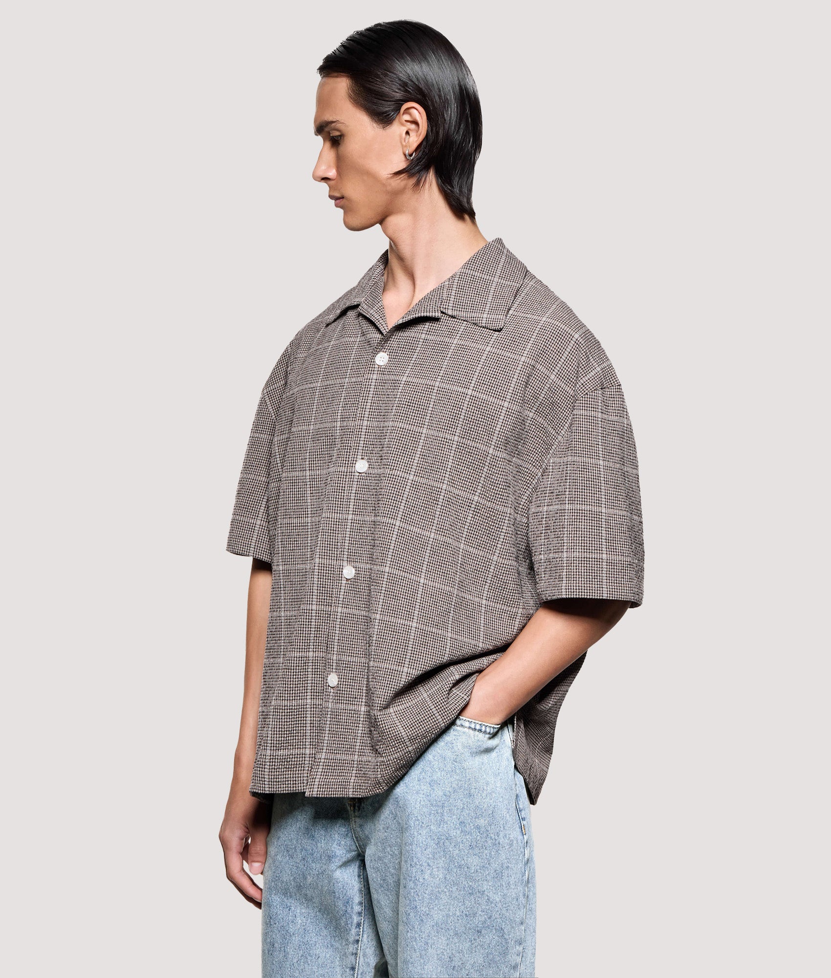 MKI MIYUKI ZOKU Box Fit Linen Short Sleeve Vacation Shirt in Brown at EQVVS Menswear. Angled model front shot.